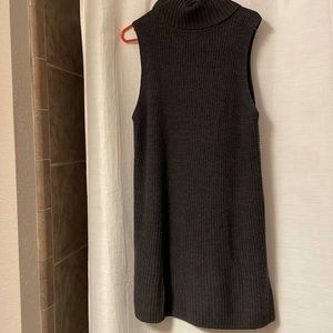 Gray sleeveless turtleneck sweater